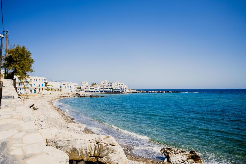 Naxos beach Apollonas fishing village beachfront stays